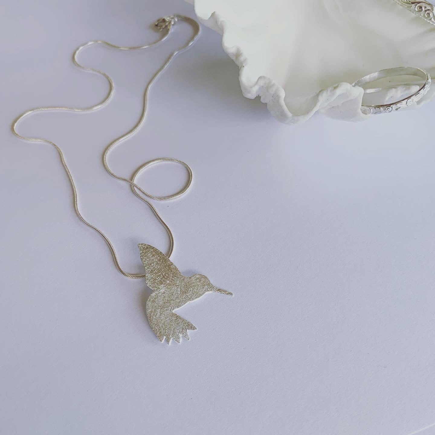 Silver hummingbird online necklace