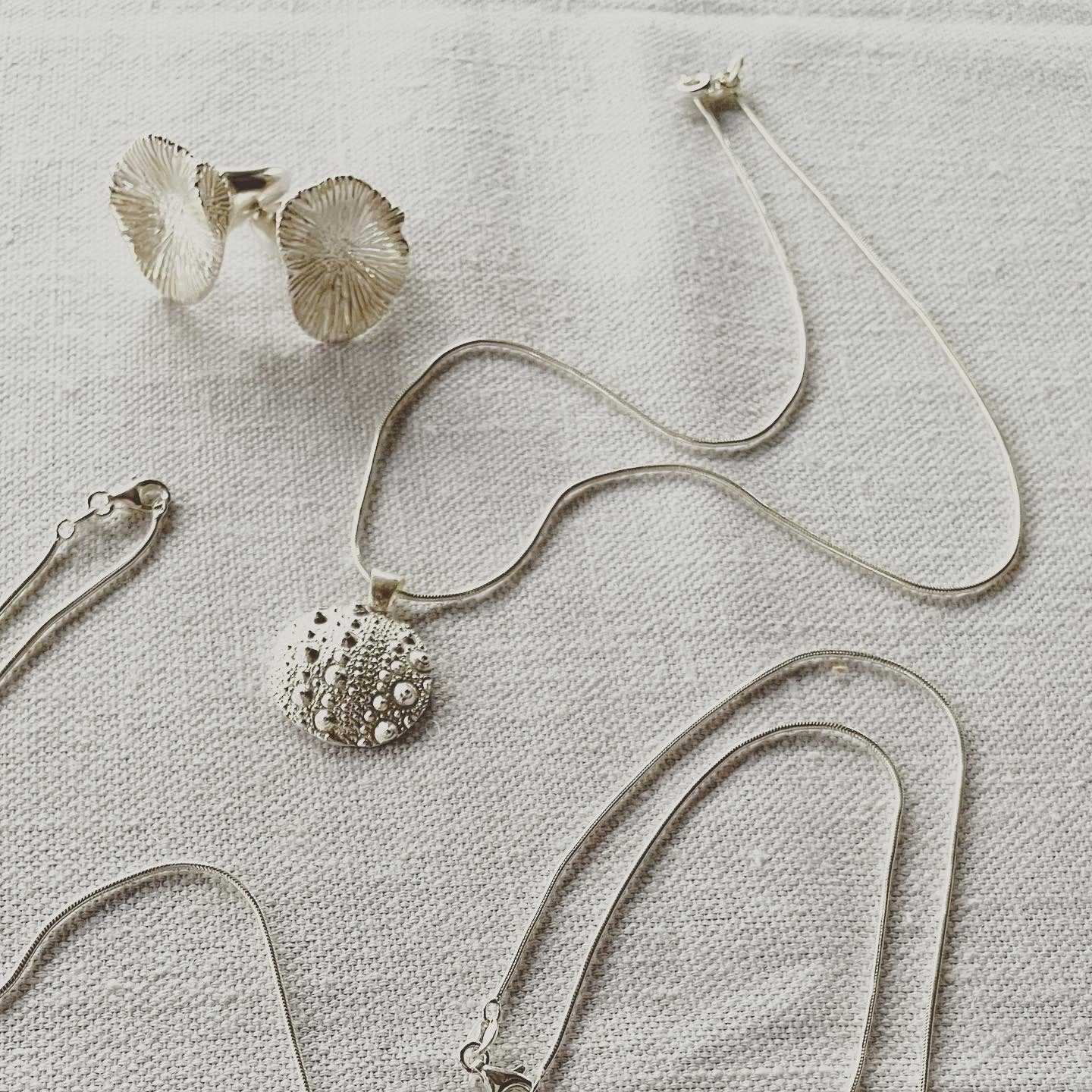 Honouring the beautiful Sea Urchin form of creation. Re-created with this stunning Neive pendant in sterling silver on sterling silver snake chain. The Sea Urchin is said to be the seer. The Sea Urchin symbolises “seeing” with your inner eye.