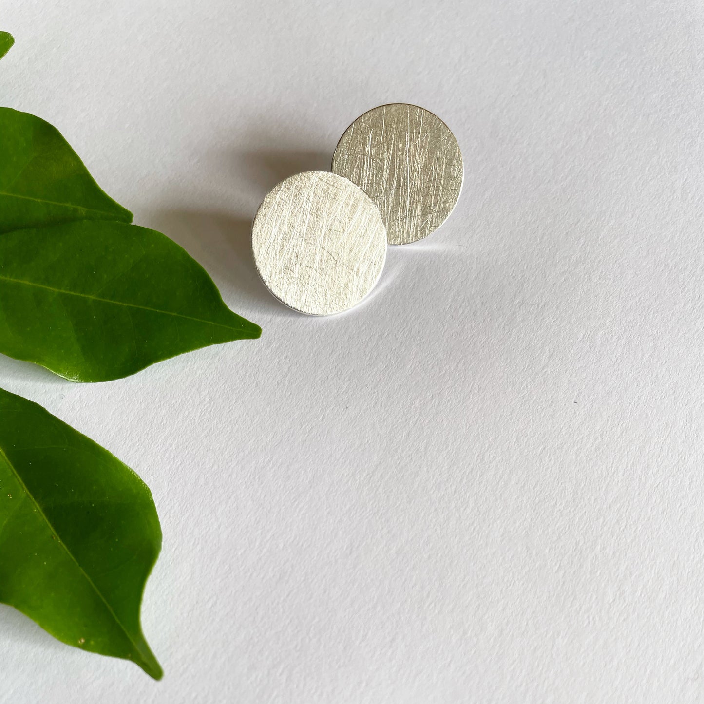 Moonscape earring studs Simple, soft yet bold..... a continuation, leading on from our Moonscape feature ring Beautiful brushed silver finish round studs Handcrafted perfection