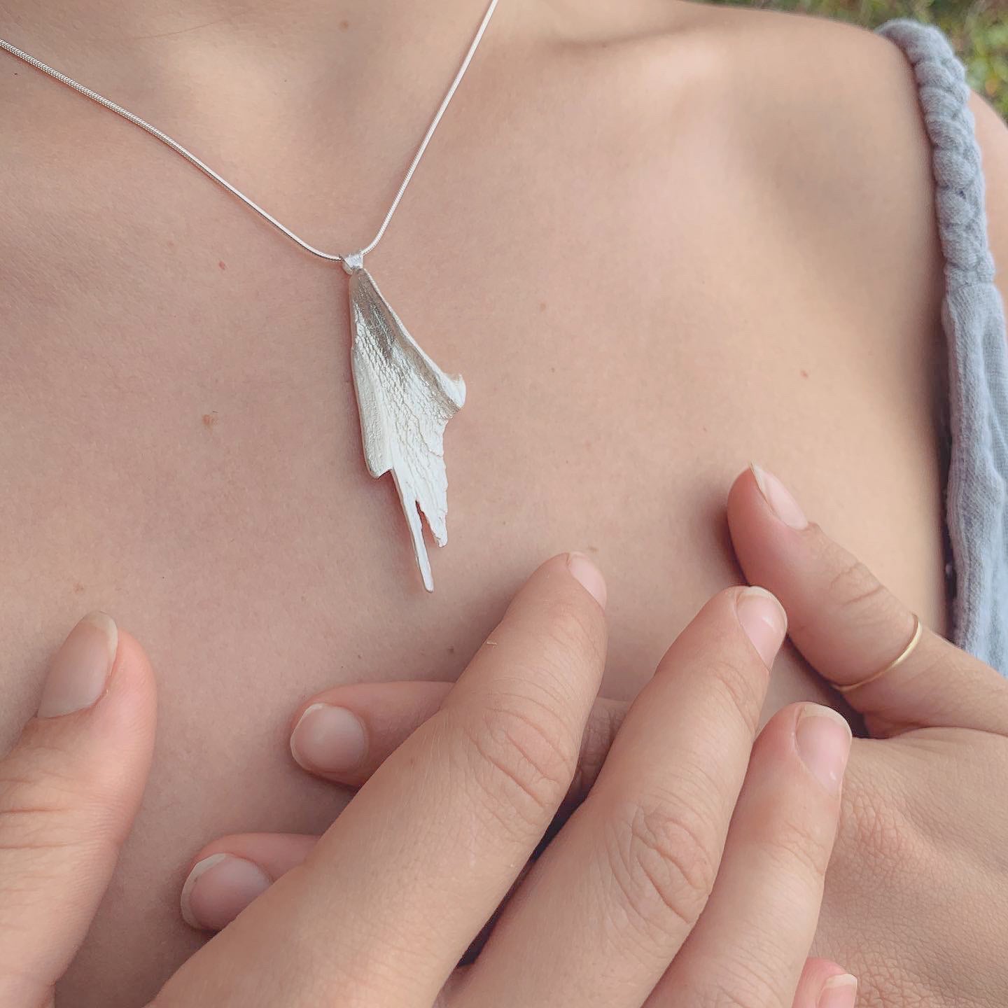 silver angel wing pendant