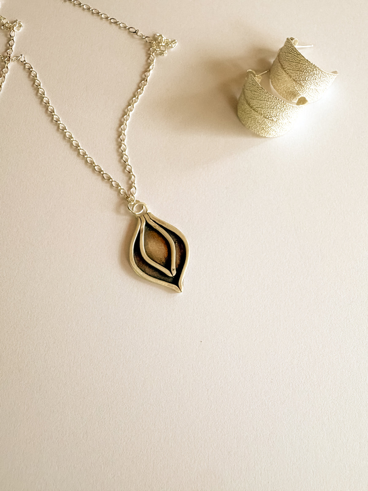 Sculptural lotus-inspired pendant