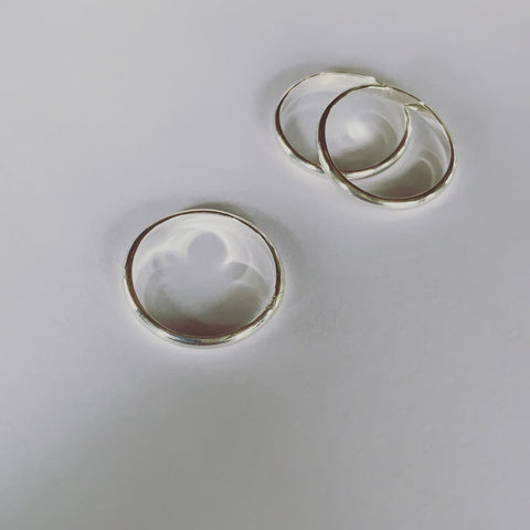 Sterling silver rings, the Never Ending Ring...... Simple, earthy and intimate.... In loving the simple things and all earthly connection. Inspired by nature........ Symbolising friendship and the simple sacred geometry of life's cycles, the circle, the unbroken and never ending rhythm of time...... This ring can be worn in combinations as a stacker ring or simply on its own. Available in 46mm, 50mm, 51mm, 52mm and 53mm circumference