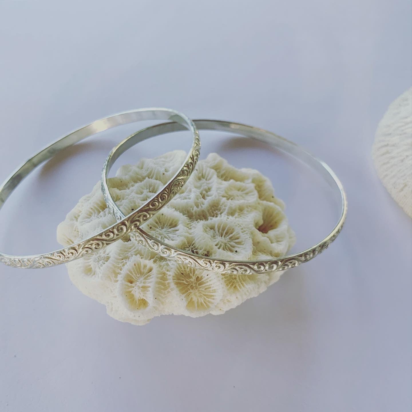 Sterling silver textured bangle. This textured beauty is funky and its silver!!  To add to those forever pieces.........  Made to last and made to love💓  Great as a trio, on it's own or mix it up with our different size solid sterling silver bangles.  It is a 4mm thick sterling silver bangle.  The inner diameter is 63mm.