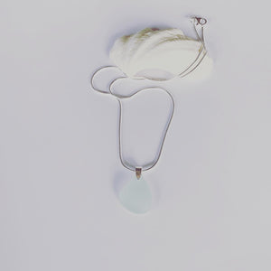 Naturally ocean tumbled sea glass drop pendant on sterling silver chain   Sea foam, light aqua sea glass........ ocean light....... ocean feels........  It's the simple things........ creating small intimate moments where one can feel the expansion...... light to wear from ocean to heart💕  Each piece may slightly vary as no piece of beach glass is the same. 