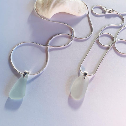 Naturally ocean tumbled sea glass drop pendant on sterling silver chain   Sea foam, light aqua sea glass........ ocean light....... ocean feels........  It's the simple things........ creating small intimate moments where one can feel the expansion...... light to wear from ocean to heart💕  Each piece may slightly vary as no piece of beach glass is the same. Unique and of the same quality only the most perfect shaped pieces are used to suit the design and how each piece sits. 